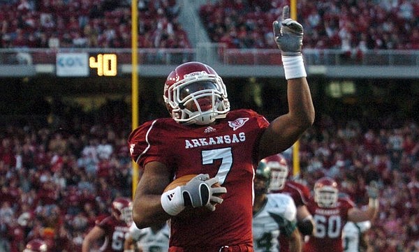 Arkansas running back Knile Davis strolls to the end zone to score the Razorbacks' first touchdown in the first quarter of their 63-27 win Saturday in Fayetteville.