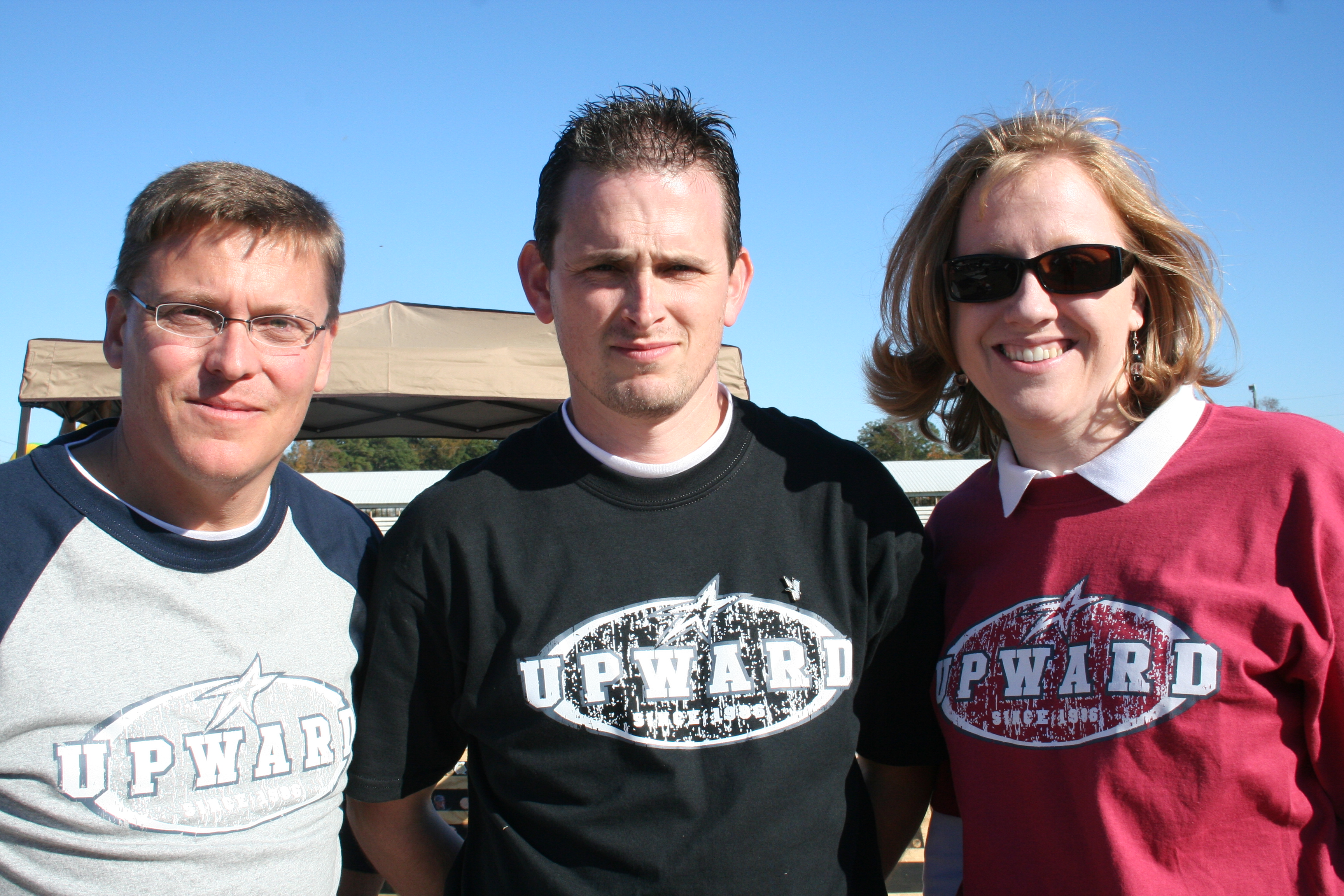 Chuck Lasley with Chad and Alicia Atwood