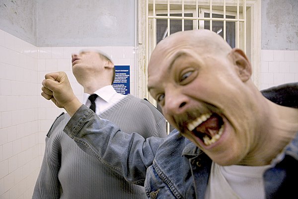 Michael “Charles Bronson” Peterson (Tom Hardy) is the most violent inmate in the British prison system in the stylized character study Bronson. 