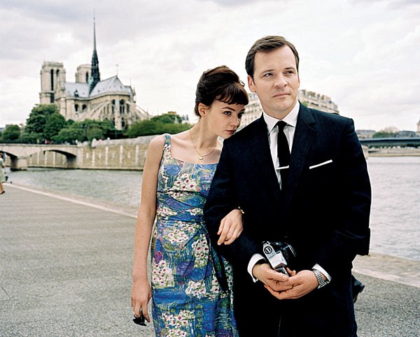 Jenny (Carey Mulligan) explores Paris on the arm of her sophisticated older boyfriend David (Peter Sarsgaard) in <em>An Education</em>.