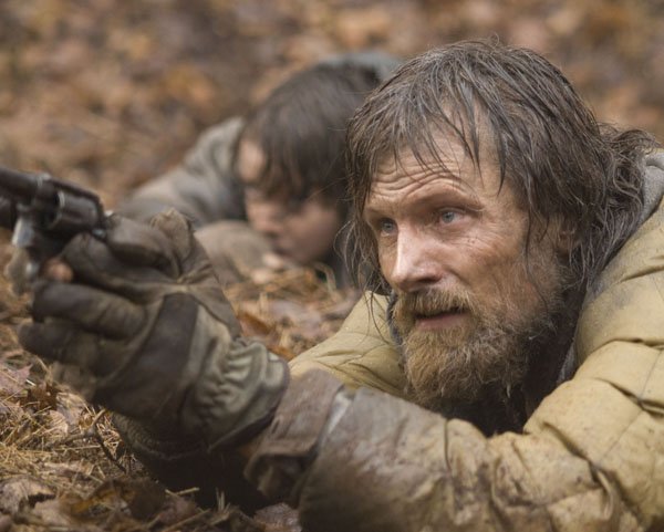 The Man (Viggo Mortensen) prepares to defend himself and his son in John Hillcoat’s film of Cormac McCarthy’s apocalyptic novel The Road. 