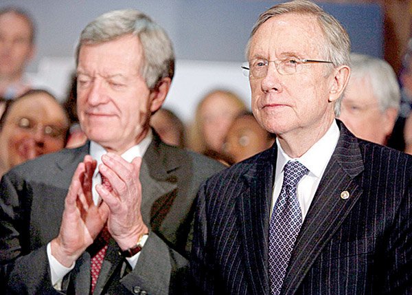  Senate Majority Leader Harry Reid of Nev., right, attends a news conference on Capitol Hill, Tuesday, Dec. 22, 2009,accompanied by Senate Finance Committee Chairman Sen. Max Baucus, D-Mont. 