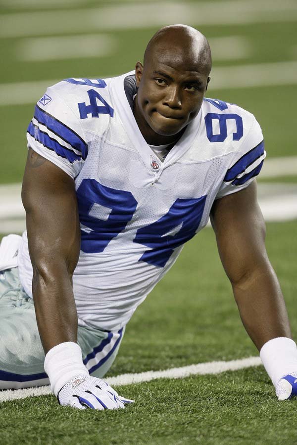  In this photo taken on Sept. 28, 2009, Dallas Cowboys linebacker DeMarcus Ware (94) loosens up before the start of an NFL football game against the Carolina Panthers in Arlington, Texas. Reigning NFL sack leader De Marcus Ware is in a four-game drought that's the longest since his rookie year, and now comes word that he's battling a neck problem. 