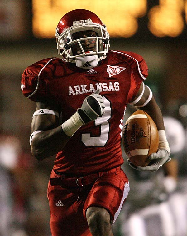 Arkansas' Joe Adams runs after the catch for a touchdown against Eastern Michigan Saturday, October 31, 2009 at Reynolds Razorback Stadium in Fayetteville.