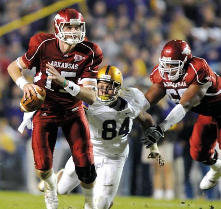 Arkansas quarterback Ryan Mallett scrambles out of the pocket against LSU on Nov. 28 in Tiger Stadium in Baton Rouge, La.