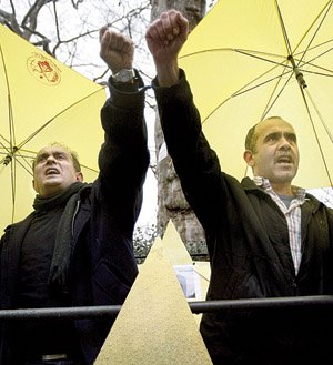 Demonstrators gather Tuesday outside the Iranian Embassy in London in support of anti-government activists in Iran. Security forces intensified their crackdown against the opposition with a wave of new arrests Tuesday.