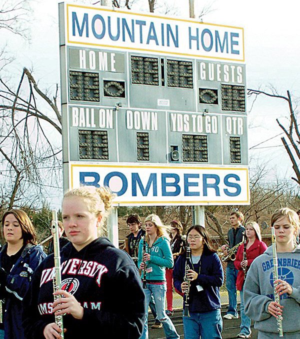 Members of the Mountain Home High School Marching Band practice for their appearances in Orlando, Fla., this week, including the Spherion Orlando Citrus Parade, which kicks off events related to the Capital One Bowl Game. 