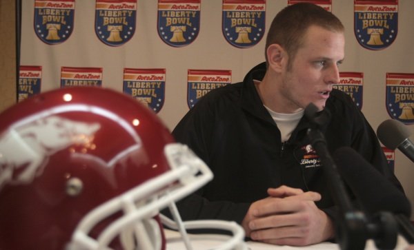 Arkansas quarterback Ryan Mallett answers questions for the media during a press conference Thursday at the Embassy Suites in Memphis.