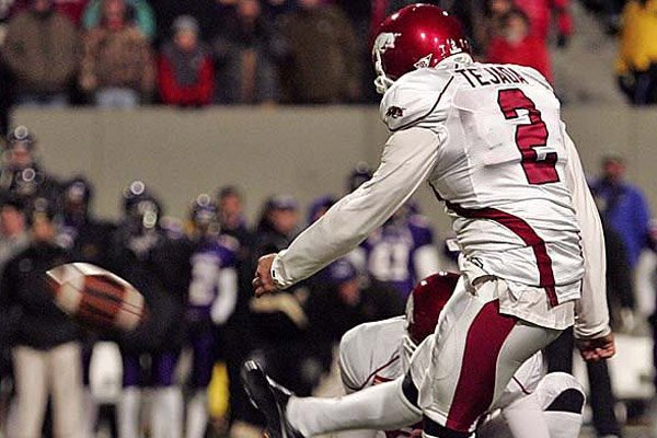 Arkansas kicker Alex Tejada kicks the game winning fieldgoal in over time to beat East Carolina 20-17 in the Liberty Bowl.