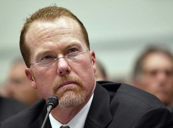 Mark McGwire, former Oakland Athletic and St. Louis Cardinal, listens during a hearing by the House Government Reform Committee on the use of steroids in baseball, Thursday, March 17, 2005 on Capitol Hill in Washington, DC. 