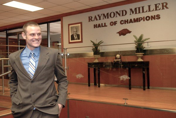 Arkansas quarterback Ryan Mallett smiles after talking with reporters and announcing his decision to return for the 2010 season with the Razorbacks.