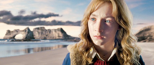 Susie Salmon (Saoirse Ronan) watches over her bereft family and the neighbor who murdered her from a kind of heaven’s anteroom in Peter Jackson’s The Lovely Bones.