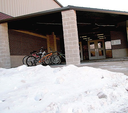 Snow remains piled up as students returned to school this week after an extended winter break due to snow and treacherous road conditions.