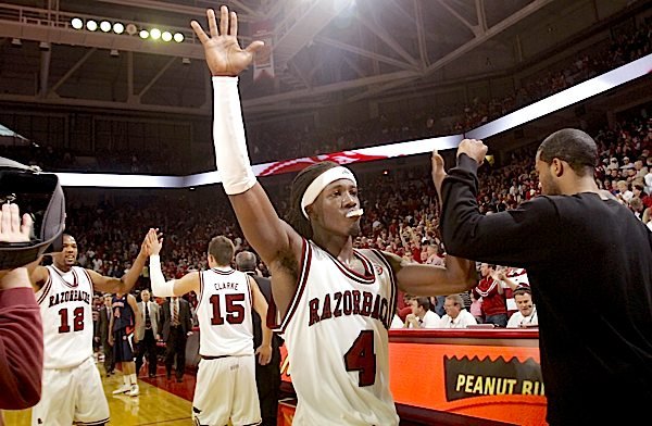 Arkansas sophomore Courtney Fortson celebrates with teammates following the Razorbacks' 82-79 overtime win over Auburn Saturday at Bud Walton Arena in Fayetteville.