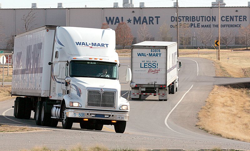 Wal-Mart Stores Inc. trucks take to the road near the company’s Bentonville distribution center in this file photo.