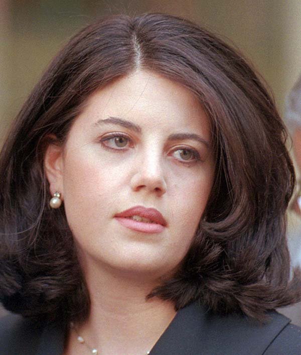  FILE--Former White House intern Monica Lewinsky leaves the Wanamaker Building in Philadelphia in this April 6, 1998, file photo. 