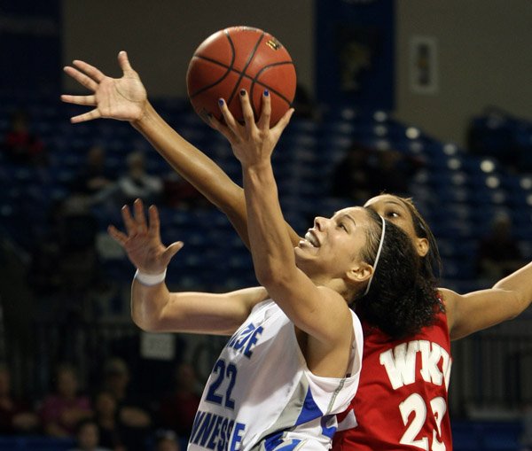 Middle Tennessee's Alysha Clark drives to the basket to score her 42nd point, to beat a Sun Belt record set earlier in the day by UALR's Chastity Reed during their Sun Belt Tournament women's semifinal game at Summit Arena in Hot Springs Monday afternoon. 