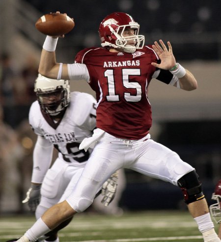  Arkansas quarterback Ryan Mallett throws during the second quarter of the Razorbacks’ Oct. 3 game against Texas A&M in Cowboys Stadium in Dallas.

