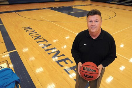 Rogers High boys basketball coach Marty Barnes announced his retirement on Monday.