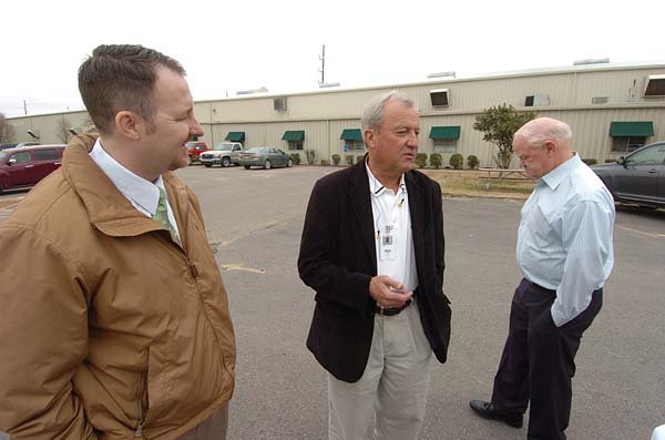 Clarksville Mayor Billy Helms (right) and Matt Wylie (left) talk with Sid Kern of Greenville Tube Co. in March. Helms has named Wylie head of a committee to look for new ways to attract companies to the city.