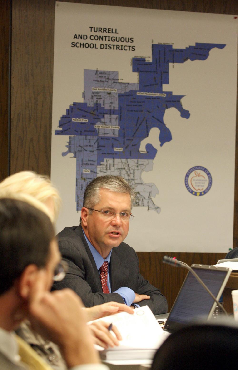 Arkansas Democrat-GazetteRICK MCFARLAND--041210-- Tom Kimbrell, director, state Department of Education, speaks Monday to the state Board of Education on recommending the consolidation of the Turrell School District with the Marion School District. The board voted to do so.