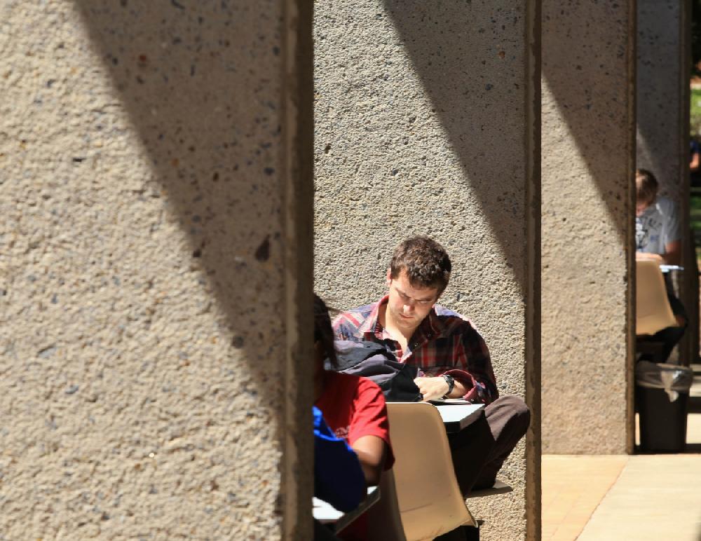 Arkansas Democrat-Gazette STATON BREIDENTHAL --41210-- North Little Rock junior Bart Carfagno(cq) studies between classes Monday afternoon at the University of Arkansas Little Rock campus.