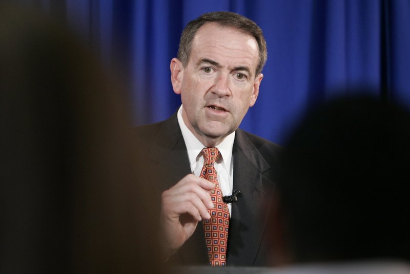 In this file photo taken Feb. 19, 2008, former Arkansas Gov. Mike Huckabee speaks at a news conference in Little Rock, Ark. 