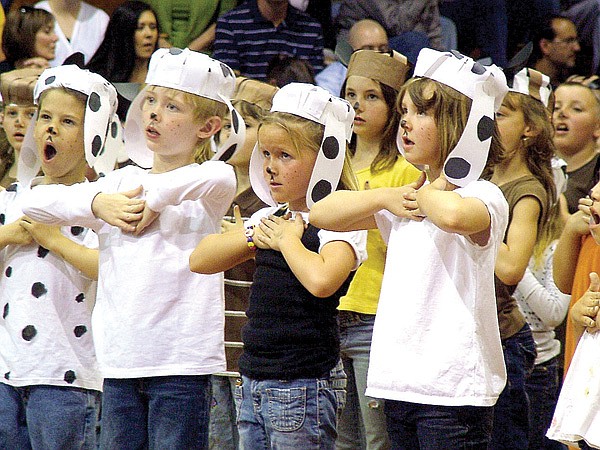 First-grade students (from left) Christopher Roggendorf, Benjamin Gibson, Gracelynn Hissung and Zaelec Harris were among the many students performing Arf!