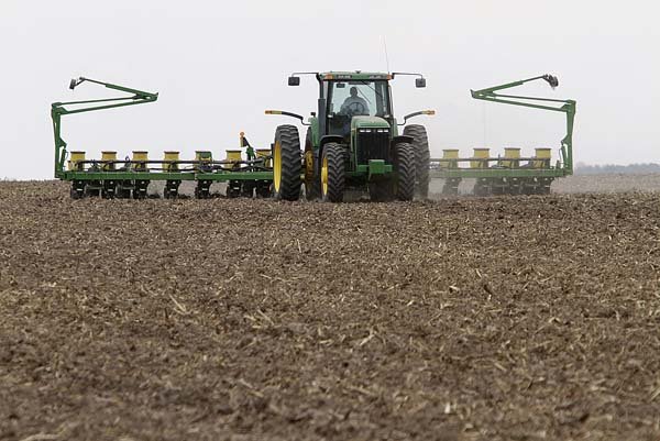 Gary Niemeyer plants 1,550 acres of corn earlier this month on his farm in Auburn, Ill.