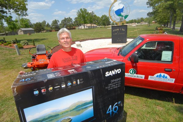 Bryan Tuggle is shown with some of the prizes to be awarded at Unity Fest, which will be held Saturday, May 29, at Batesville’s Riverside Park.