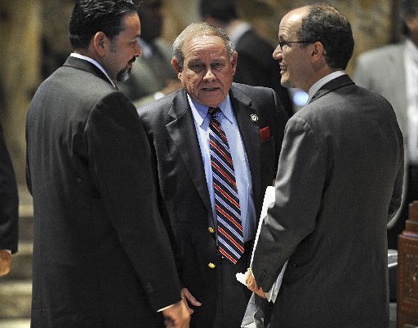 Thomas E. Perez, U.S. Assistant Attorney General, Office of Civil Rights Division, visits with Rep.Rick Gallot, D-Ruston, Sen. Bob Kostelka, R-Monroe, center, in the House Chamber, after a joint meeting of Louisiana Senators and Representatives, Wednesday, May 5