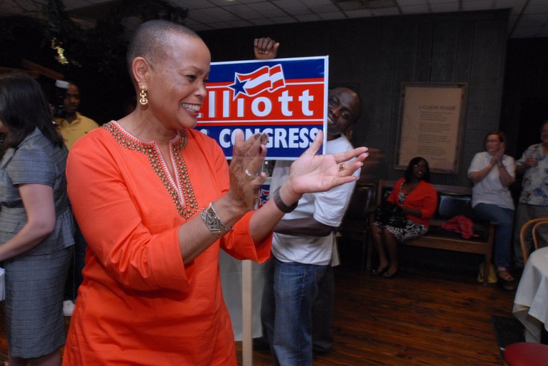 Joyce Elliott celebrates her results on Tuesday night at her watch party at Cajun's Wharf.