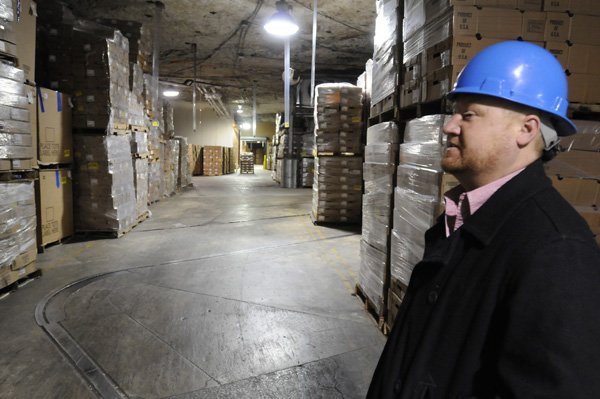Tony Parrish, office manager at Zero Mountain Storage, gives a quick tour of the company’s Johnson facility May 13. The cold storage industry has faced its own set of challenges during this recession.
