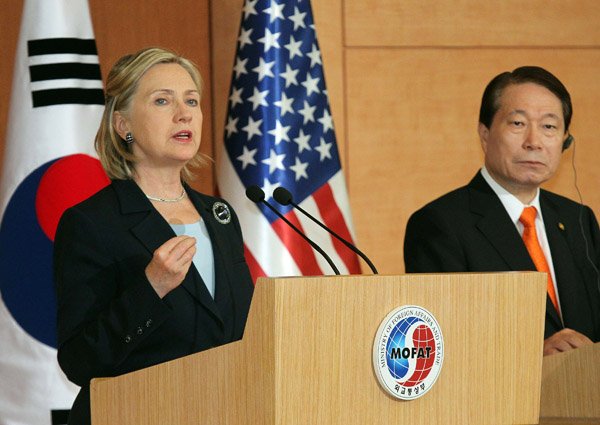 Secretary of State Hillary Clinton speaks as Yu Myung Hwan, South Korea's foreign minister, listens during their joint news conference in Seoul, South Korea, on Wednesday.