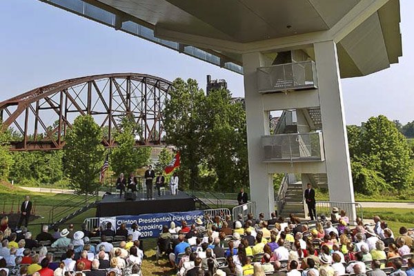A crowd gathers Friday under the Clinton Presidential Center in Little Rock for the groundbreaking of the Clinton Presidential Park Bridge.