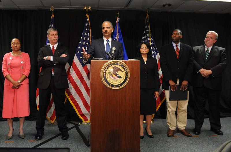 From left, U.S. Attorney for the Western District of Louisiana Stephanie Finley, U.S. Attorney for the Eastern District of Louisiana Jim Letten, U.S. Attorney General Eric Holder, Assistant Attorney General for the Environment and Natural Resources Divsion Ignacia Moreno, Assistant Attorney General, Civil Division Tony West and U.S. Attorney for the Southern District of Mississippi Don Burkhalter announce to reporters that the Justice Department has launched a criminal investigation into the BP oil  spill in the Gulf of Mexico. 
