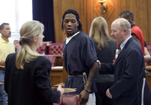 Laquan Fitzpatrick (left) makes his first court appearance Tuesday afternoon since being charged in the Christmas Eve shooting death of Salvation Army Major Philip Wise.