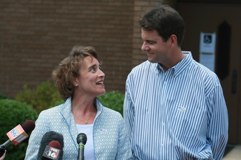 Sen. Blanche Lincoln and her husband leave a precinct after voting Tuesday.