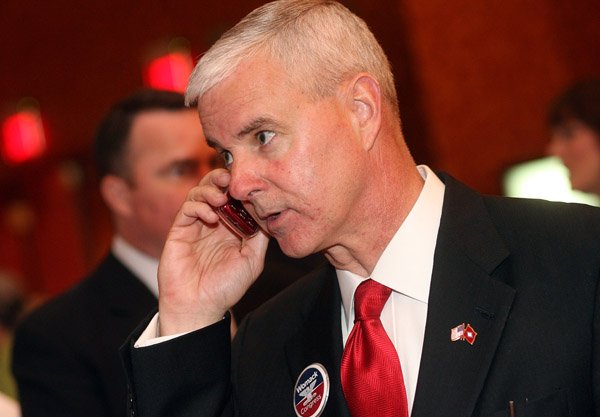 Steve Womack talks on the phone during his primary election watch party in May at the John Q. Hammons Center in Rogers.