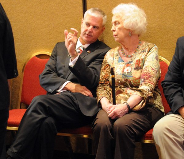 Rogers Mayor Steve Womack talks with a supporter during the election watch party at the Embassy Suites in Rogers Tuesday evening. With all precincts reporting, Womack won the Republican nomination with 18,290 votes (52 percent). His opponent Cecile Bledsoe had 17,048 (48 percent).