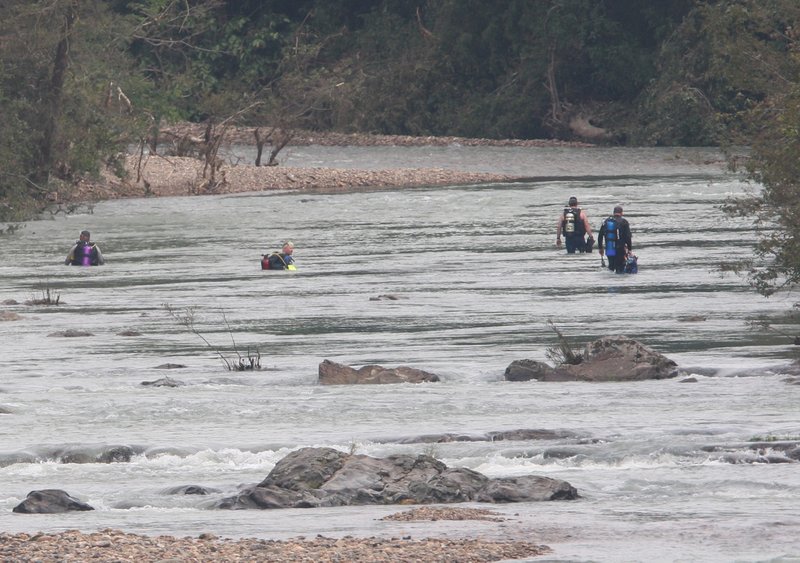 This June 14, 2010 file photo shows search and rescue crews searching the Little Missouri River.