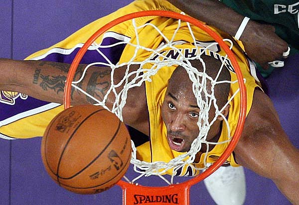 Kobe Bryant grabs the basketball as time expires in game 7 of the 2010 NBA  Finals.