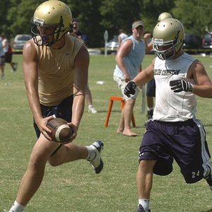 Pulaski Academy’s Hunter Henry (left) catches a second-half touchdown pass over Shiloh Christian’s David Tyler during the Bruins’ 36-30 semifinal victory Saturday at the Shootout of the South 7-on-7 tournament in Little Rock. The Bruins beat Allen, Texas, 48-14 to take the tournament title.