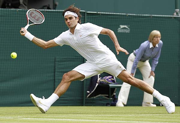  Switzerland’s Roger Federer lost his first two sets Monday before rallying to defeat Colombia’s Alejandro Falla during the opening round of the Wimbledon Championships at the All England Lawn Tennis & Croquet Club in Wimbledon, England. Federer won 5-7, 4-6, 6-4, 7-6 (1), 6-0.