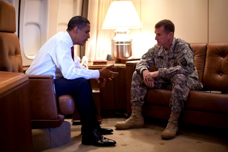 This Oct. 2, 2009, file photo provided by the White House shows President Barack Obama meeting with Gen. Stanley McChrystal, the top commander in Afghanistan, aboard Air Force One in Copenhagen, Denmark. 