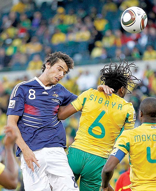 France’s Yoann Gourcuff (8) fouls South Africa’s Macbeth Sigaya (6) in the first half Tuesday in Bloemfontein, South Africa. Gourcuff was given a red card for the foul and ejected.