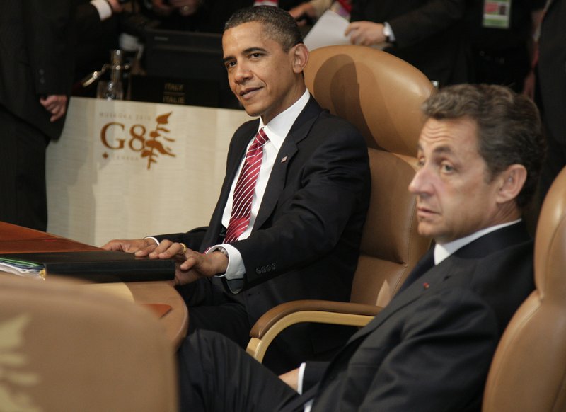 US President Barack Obama and French President Nicolas Sarkozy, left, attend a leaders working session at the G8 Summit at Deerhurst Resort in Huntsville, Ontario, Saturday, June 26, 2010. 