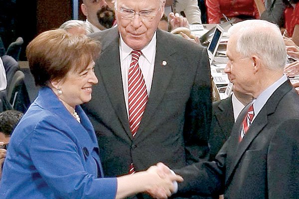 Supreme Court nominee Elena Kagan is greeted by Sen. Jeff Sessions (right) and Sen. Patrick Leahy as she arrives for her Senate confirmation hearing Monday in Washington.