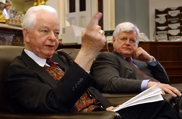 Byrd and his friend Sen. Edward Kennedy talk with reporters about Iraq on Jan. 30, 2003, in Washington.