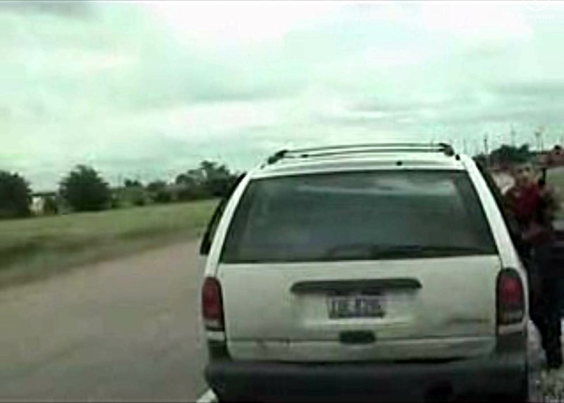 A photo taken from a dashboard camera video shows teenager Joseph Kane step out of a van with a gun.